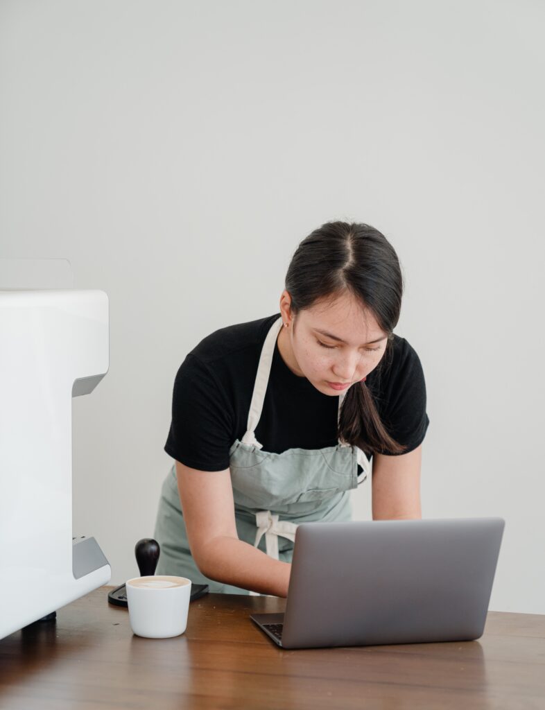 Small_business_owner_doing_taxes_on_laptop